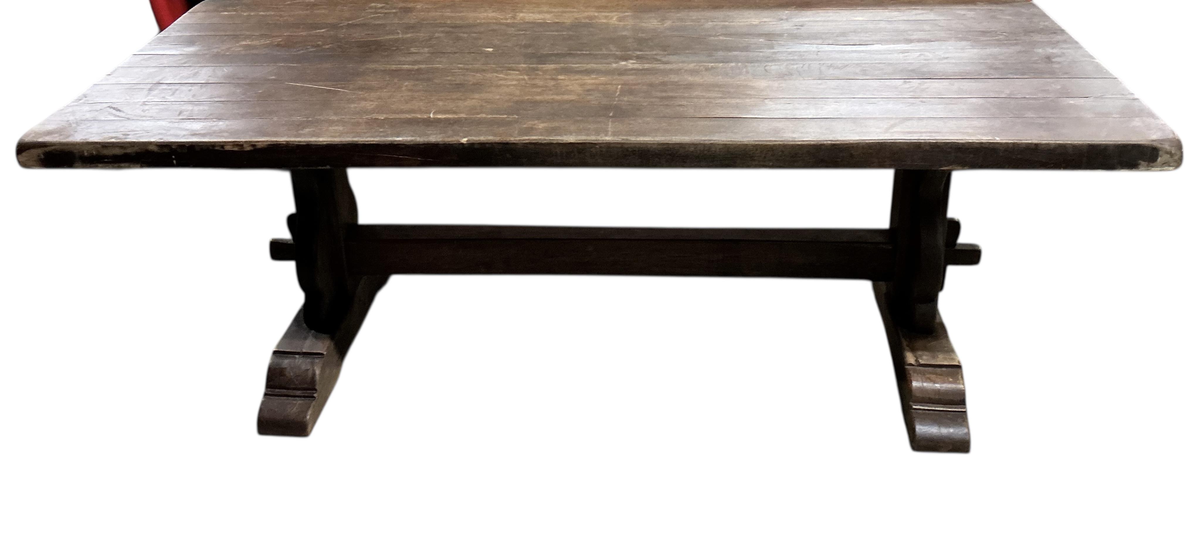 An 18th century style rectangular oak refectory dining table, width 214cm, depth 88cm, height 76cm